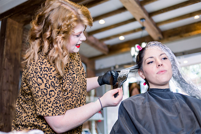 Hair stylist with her client Hair cutting